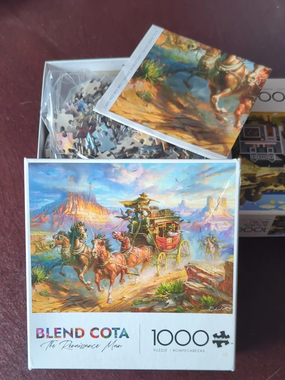 (3) Buffalo Games and Puzzles 1000pc Puzzles. See pictures